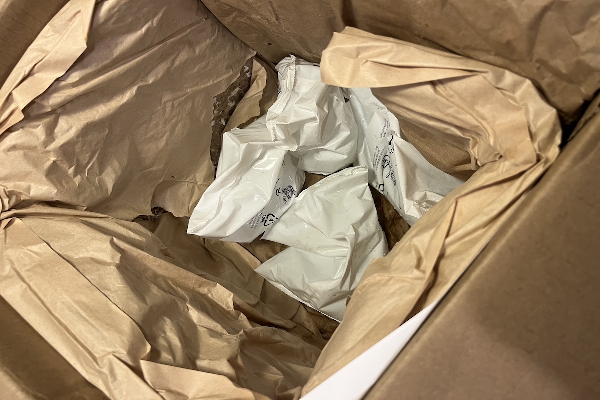 The cardboard box the Fresh N Lean meals came in, with an insulated center and ice gel bags.
